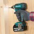 Винтоверт аккумуляторный ударный 18 В 2х3,0 Ач 165 Нм HEX 1/4 Makita LXT DTD152RME
