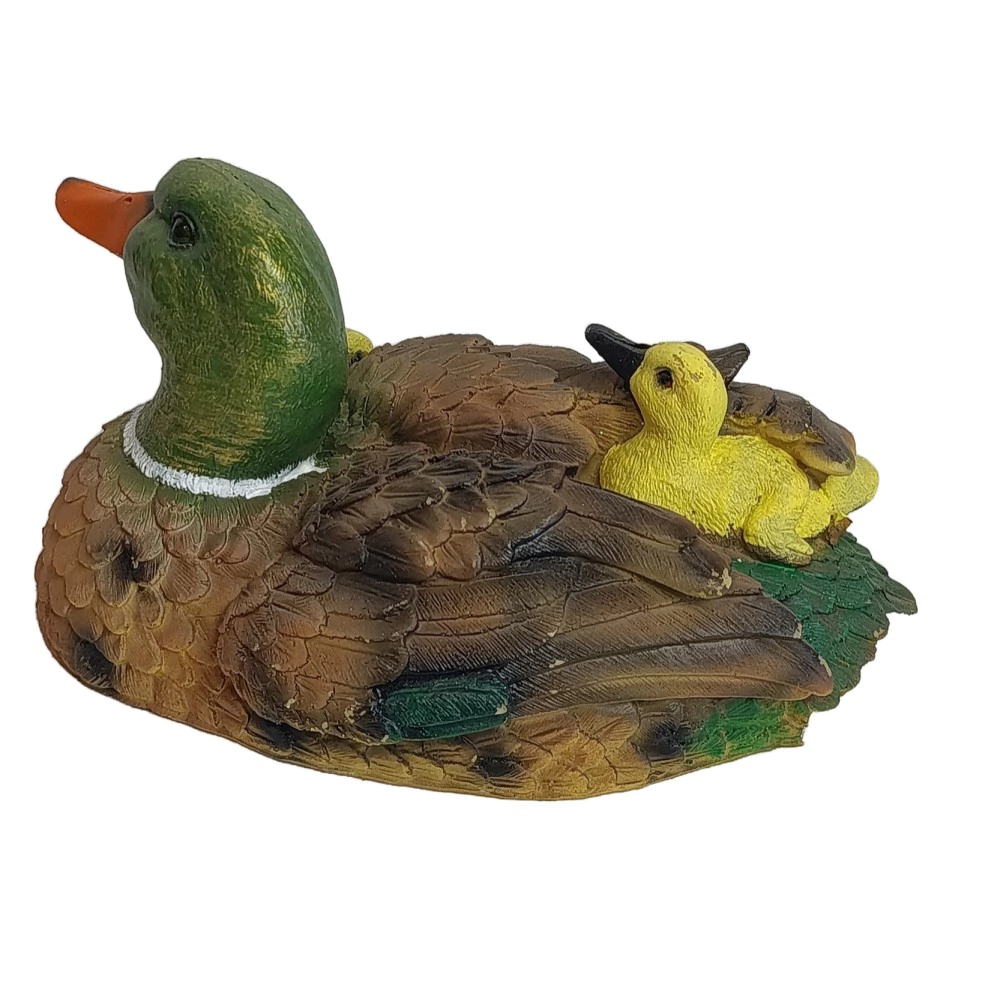 Садовая фигура Утка с утятами плывет 14х30х16 см