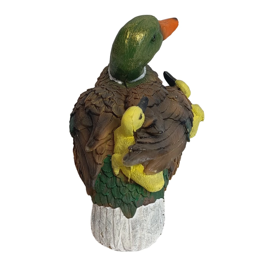 Садовая фигура Утка с утятами плывет 14х30х16 см